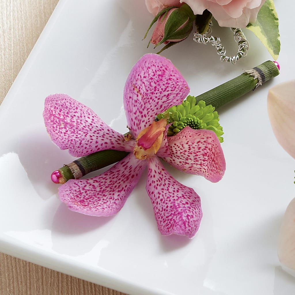 Pink Mokara Boutonniere – MARIE'S FLOWER & GIFT SHOPPE INC, Moultrie GA